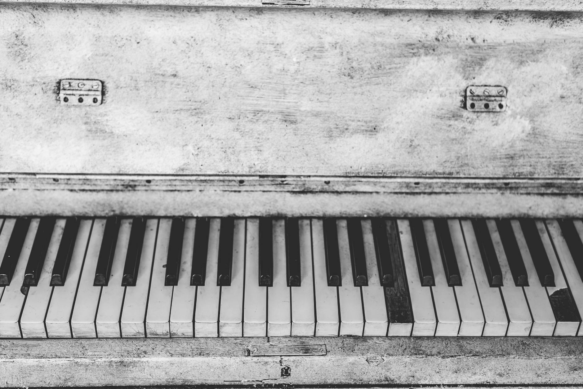 black and white upright piano