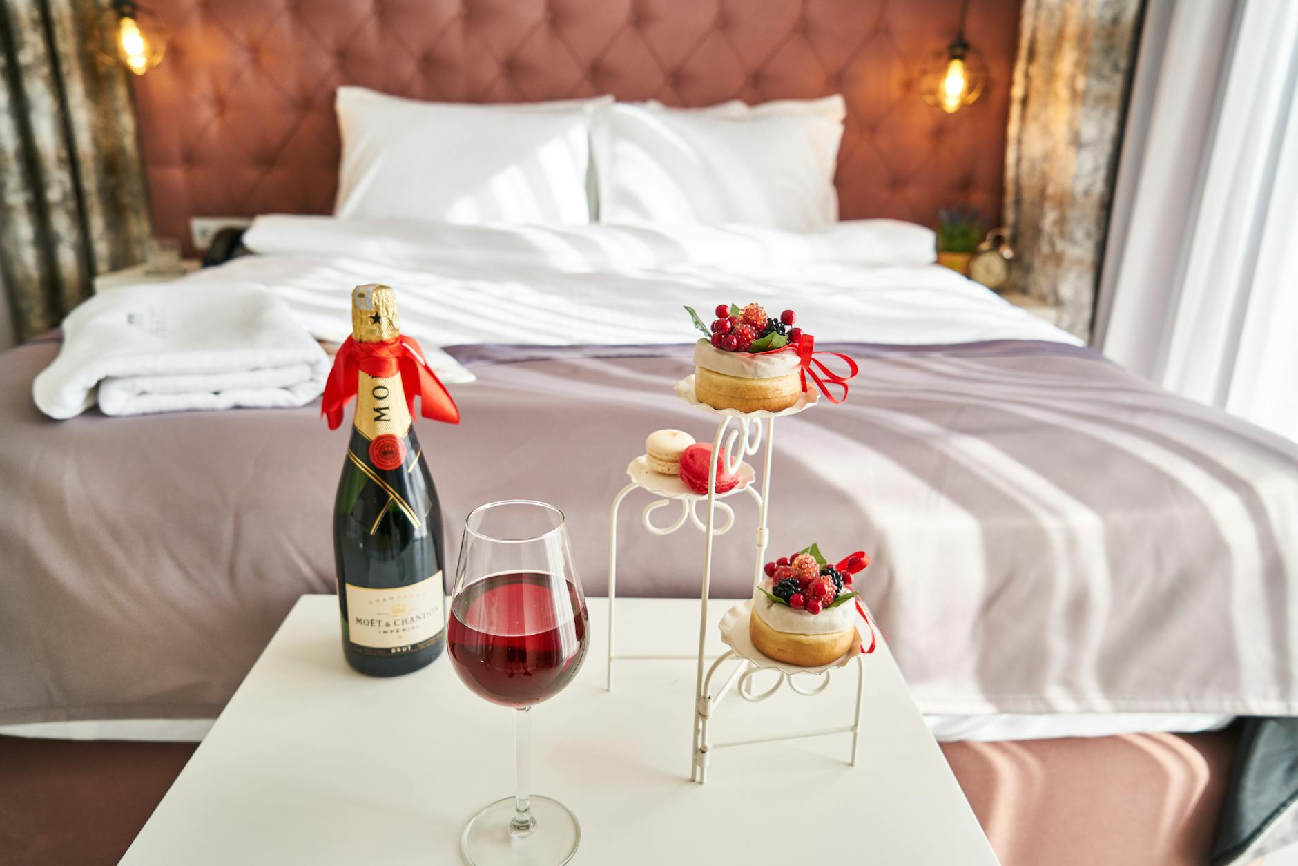 photo of wine bottle and food on table