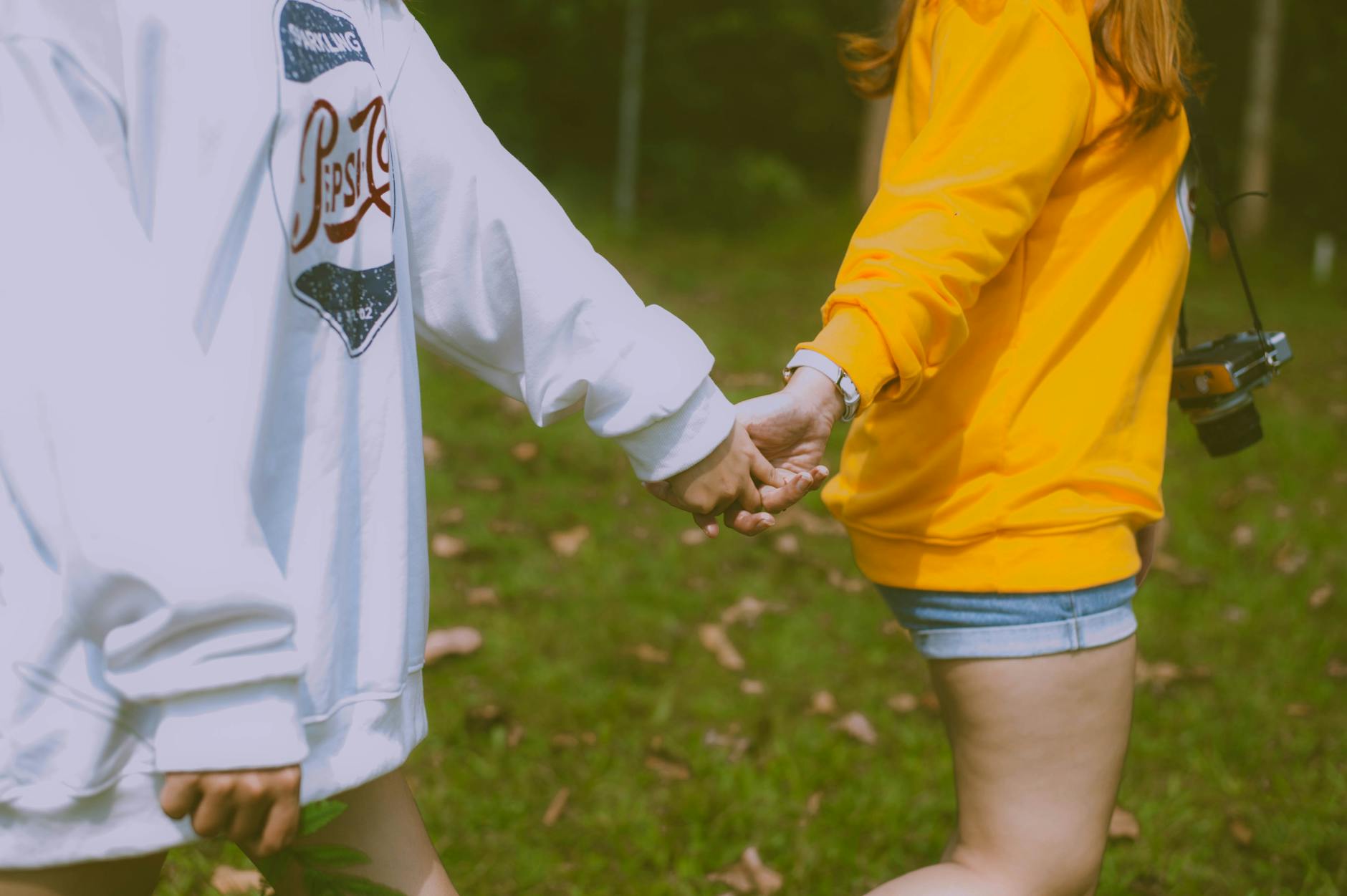 a couple holding hands