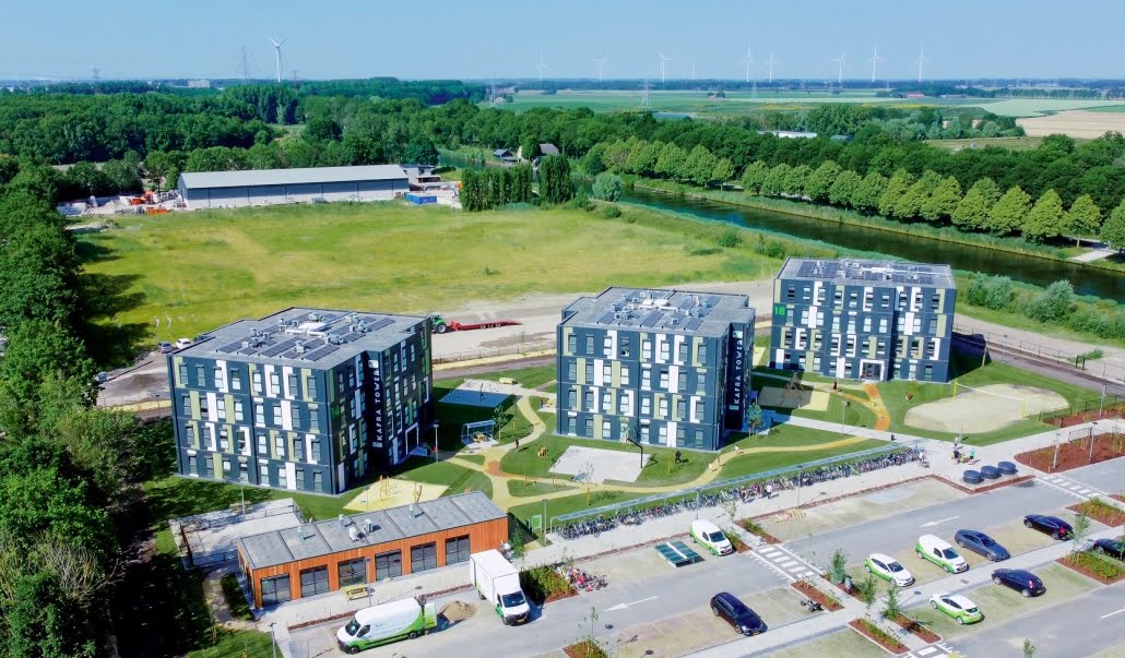 Gesprek over huisvesting van arbeidsmigranten en samenwerking tussen gemeenten en werkgevers